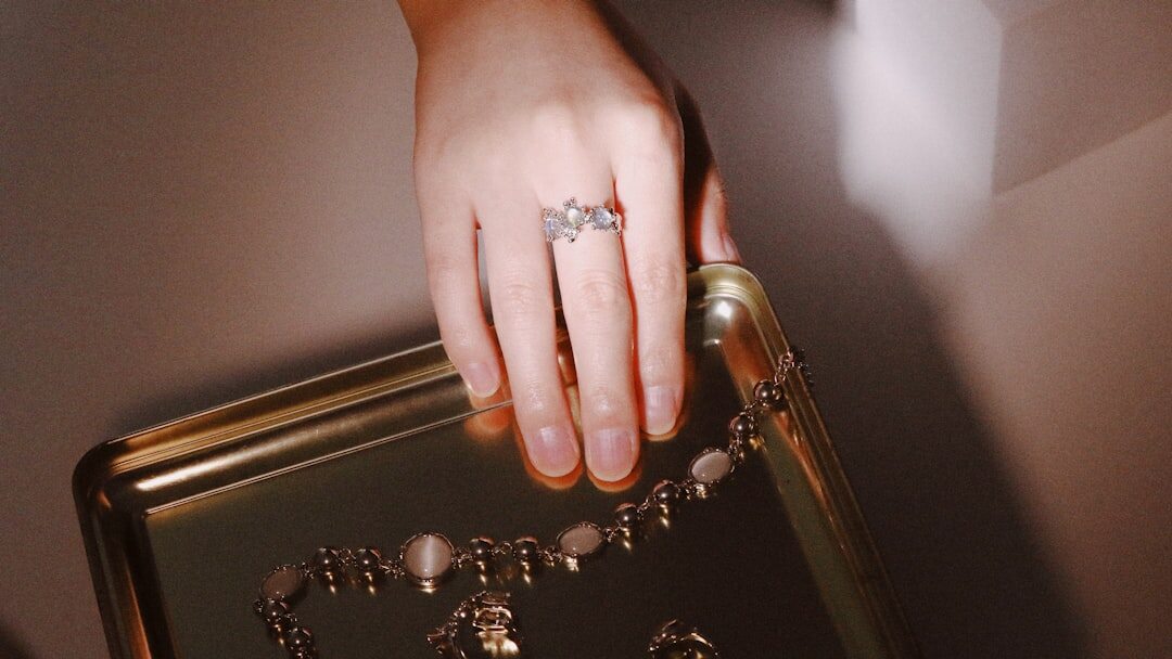 elegant woman choosing necklace